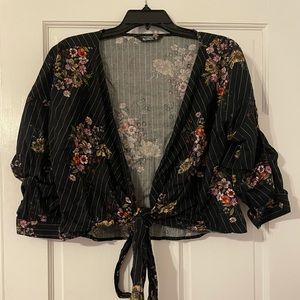 Cute black floral front tie blouse!